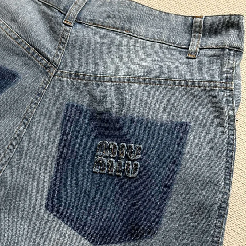 稀少 ミュウミュウ パロディ ロゴ刺繍入り ジーンズ myl39785