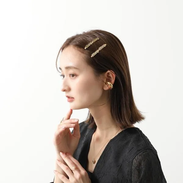 ミュウミュウ ヘアピン 偽物 エナメルメタル ロゴ 5IF146